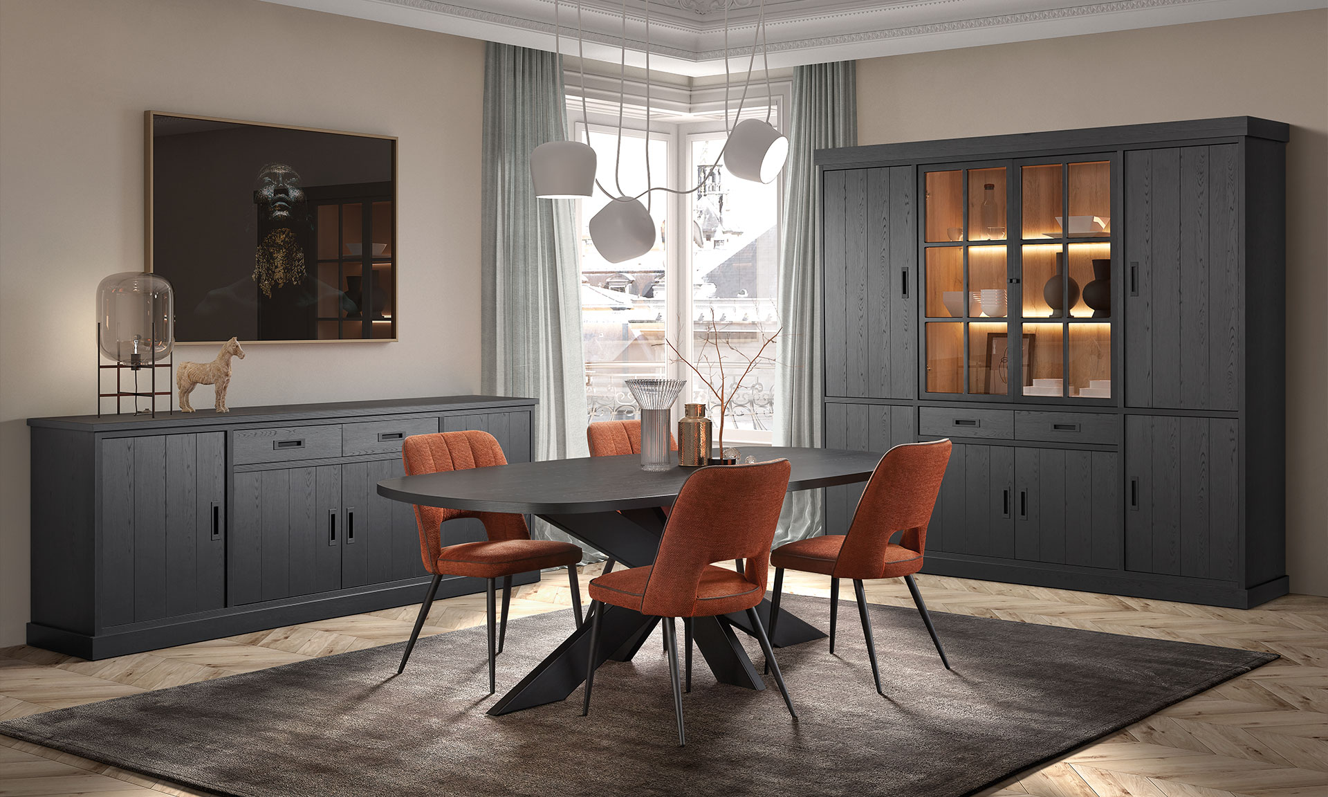 Séjour avec une collection en gris anthracite. Une table tonneau, un buffet et une vitrine.